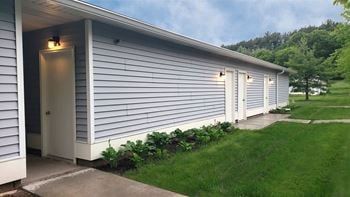Detached, shared garage